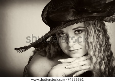 old portrait photo a beautiful young women in hat