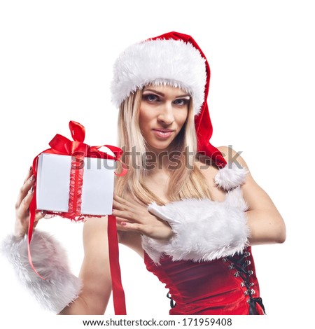Beautiful woman in Santa Clause costume with extra long blonde hair. Winter portrait of sexy girl with copy space. Attractive new year and xmas party lady, isolated on white background