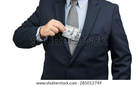 Man pulling dollar money cash out form suit on white background