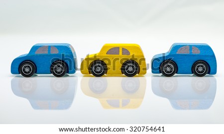 Old retro toy cars on white background. Colorful objects