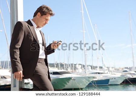 Close up profile of a businessman using his \
