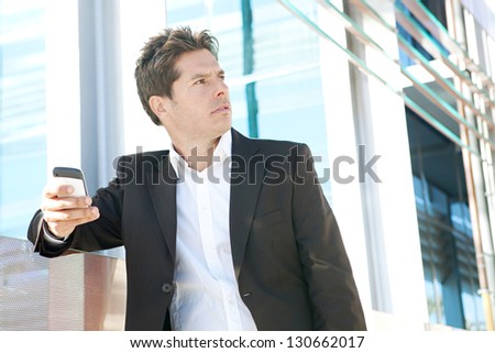 Close up portrait of a professional business man holding a \