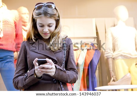 Similar – Image, Stock Photo Stylish teenagers using smartphone outdoors