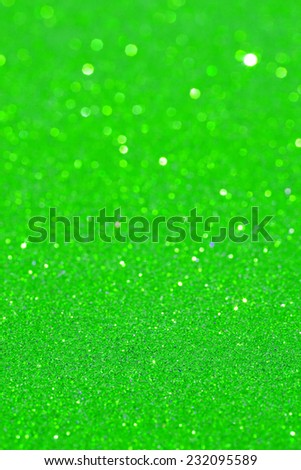 Abstract green color glitter festive background frame with shining stars and galaxy like feel. Christmas decorative and festivity celebration background texture. Luxury texture white glitter.