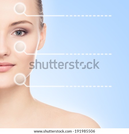 Close-up portrait of young, fresh and natural woman with the dotted arrows