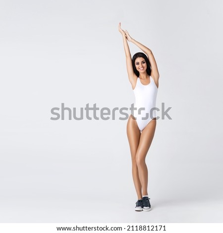 Similar – Image, Stock Photo Slim woman in bodysuit in studio