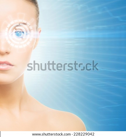 Young  woman from future with the laser hologram on her eyes (eye scanning technology, optometry and virtual reality concept)