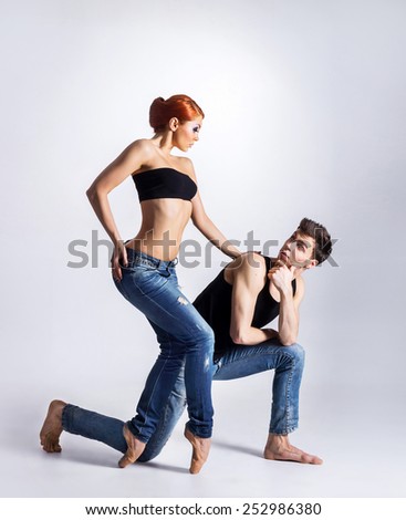 Couple of modern ballet dancers in jeans
