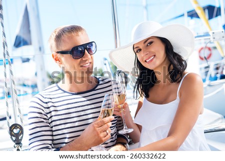 stock photo young attractive and rich couple have a party on a luxury boat 260332622