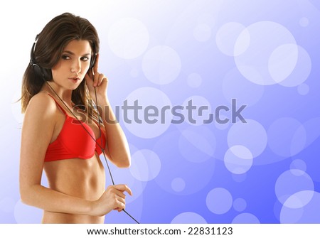 Sexy dj girl over abstract background