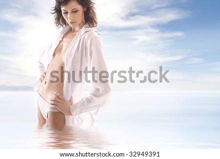 Attractive lady wearing wet female shirt