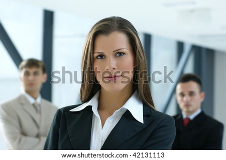 Portrait of business team over modern background