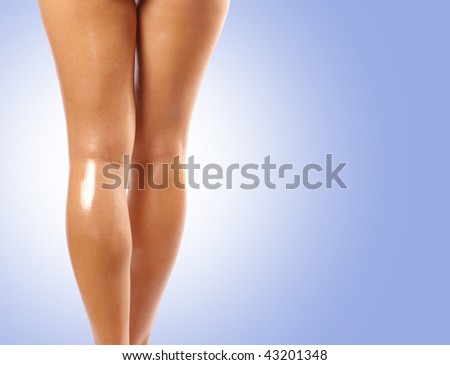 Back and ass of beautiful woman over blue background