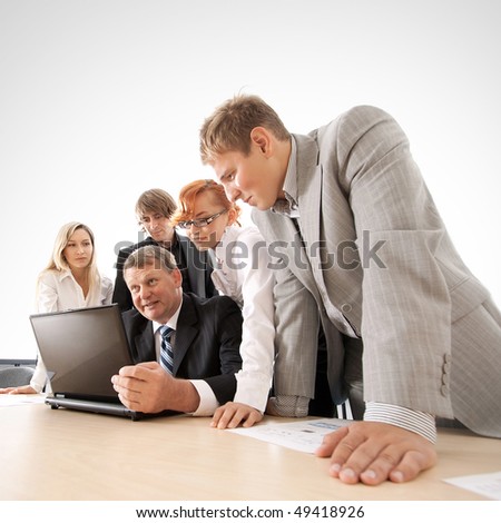 Some business people at work over blue background