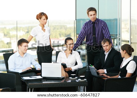 Group of some business people working in the open air office (WARNING! Low depth of field)