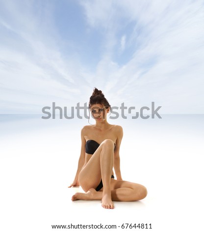 Sexy lady isolated over sea and sky background