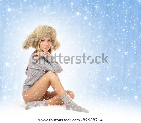 Young sexy girl in winter dress