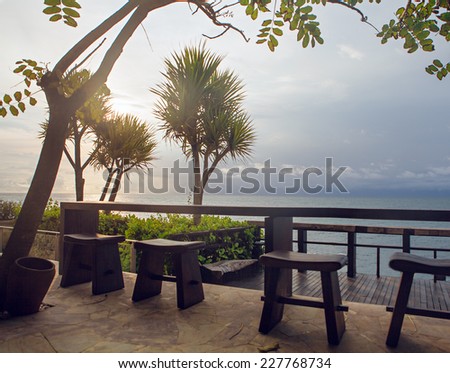 Empty bar with sea view and beautiful sunset on Bali