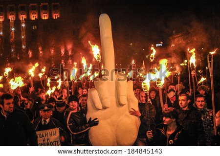 SOFIA,BULGARIA - DEC 14-Thousands of protesters bocked on of the main streets, Sofia,Bulgaria Dec 14, 2013. Activists marching on the streets with fire torches.