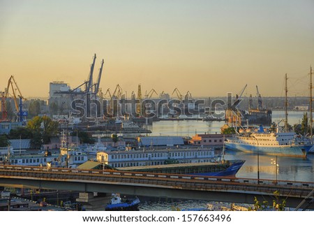 Odessa port at the sunset with cargos and boats