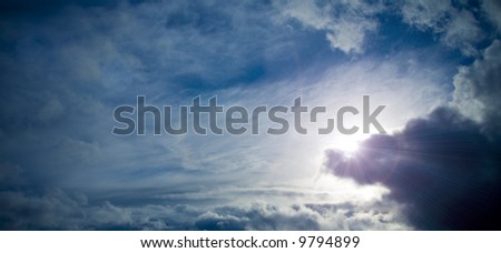 Bright Sun covered by clouds