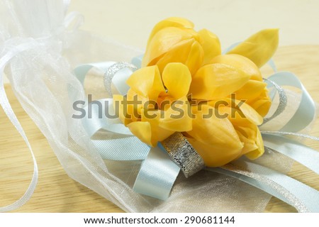 Unfocused Fragrant yellow flowers. (Scientific name : Champaka - Michelia alba DC.)