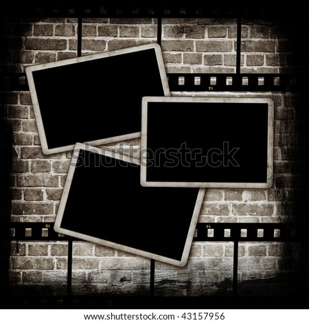 Blank photo frames on brick wall. More available in my portfolio.