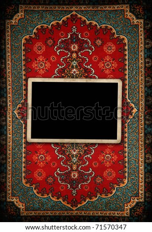 Photo frame on old carpet