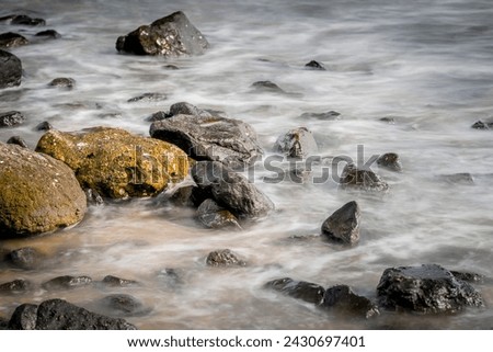 Similar – Image, Stock Photo Rocky formation in foamy sea