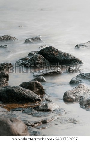 Similar – Image, Stock Photo Rocky formation in foamy sea