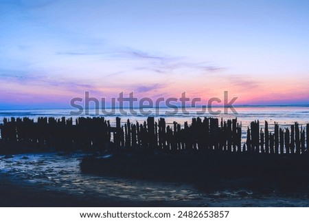 Similar – Image, Stock Photo The Wadden Sea World Heritage Site with coastal protection on the coast of the North Sea at the harbor of Norden near Norddeich in East Frisia in Lower Saxony, photographed in classic black and white