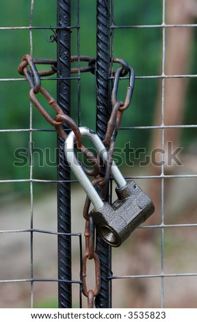 Gate locked on a padlock