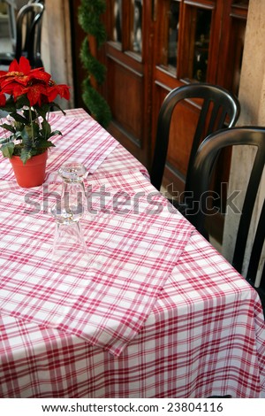 Free restaurant table with a table-cloth outdoor
