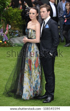 Laura Haddock and Sam Clafin arriving for the premiere of \