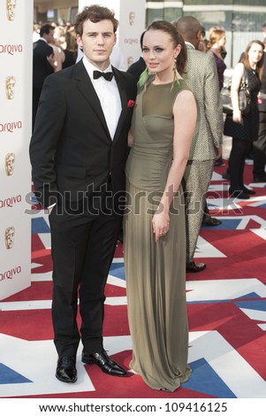 Sam Claffin and Laura Haddock arriving  for the 2012 BAFTA Television Awards Royal Opera House, Southbank London. 27/05/2012 Picture by: Simon Burchell / Featureflash