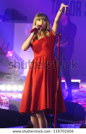 Taylor Swift performs and turns on the Christmas Lights at Westfield Shepherd\'s Bush, London. 06/11/2012 Picture by: Steve Vas