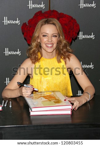 Kylie Minogue signs copies of her book Kylie/Fashion at Harrods London, England. 28/11/2012 Picture by: Henry Harris