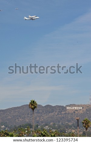 The Space Shuttle Endeavour does a flyby over the Hollywood sign in Los Angeles before landing at LAX. September 21, 2012  Los Angeles, CA Picture: Paul Smith