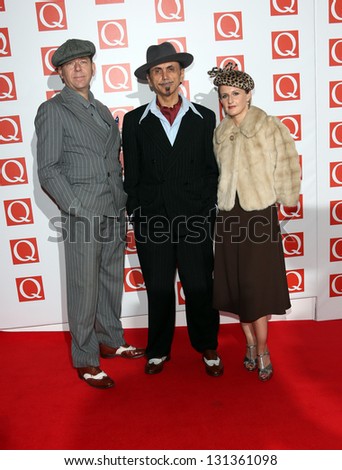 Pete Williams, Kevin Rowland and Helen O\'Hara of Dexys Midnight Runners arriving for The Q Awards 2012 held at the Grosvenor Hotel, London. 22/10/2012 Picture by: Henry Harris