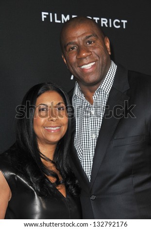 Earvin Magic Johnson & wife Cookie at the Los Angeles premiere of \