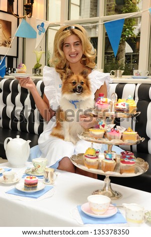 Francesca Hull and \'Evie\' launch the Blue Cross charity Tea Party appeal at the Milestone Hotel, Kensington, London. 09/04/2013 Picture by: Steve Vas