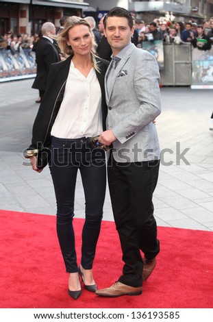 Tom Chambers and Clare Harding arriving for the Iron Man 3 Premiere, Odeon Leicester Square, London. 18/04/2013 Picture by: Alexandra Glen