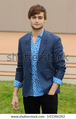 Douglas Booth arriving for the Burberry Prorsum Menswear show as part of London Collection Men SS14, Perks Field, Kensington, London. 18/06/2013