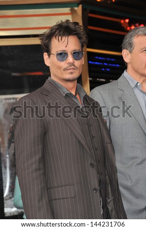 Johnny Depp on Hollywood Boulevard where Jerry Bruckheimer was honored with the 2,501st star on the Hollywood Walk of Fame. June 24, 2013  Los Angeles, CA