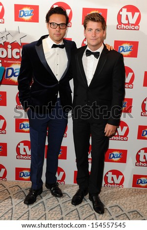Andy Jordan and Stevie Johnson arriving at The TV Choice Awards 2013 held at the Dorchester, London. 09/09/2013