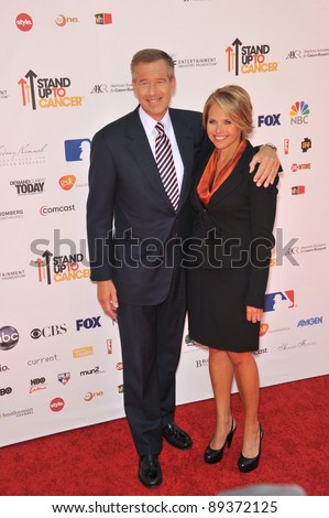 TV news anchors Brian Williams & Katie Couric at the Stand Up To Cancer event at Sony Pictures Studios, Culver City. September 10, 2010  Culver City, CA Picture: Paul Smith / Featureflash