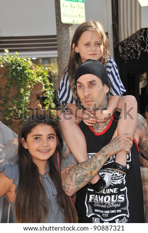 Blink 182 star Travis Barker & kids at the Los Angeles premiere of 