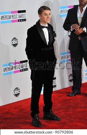 Justin Bieber arriving at the 2011 American Music Awards at the Nokia Theatre, L.A. Live in downtown Los Angeles. November 20, 2011  Los Angeles, CA Picture: Paul Smith / Featureflash