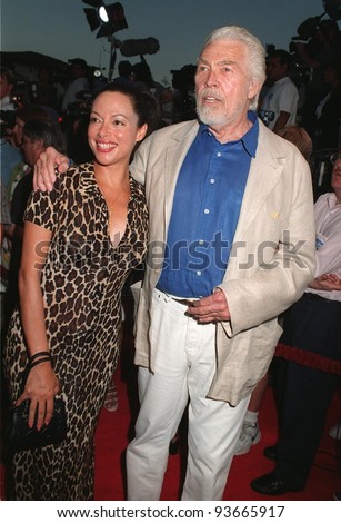 04AUG97:  Actor JAMES COBURN & wife PAULA at the premiere of \