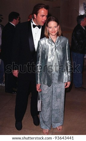 17APR98:  Actress JODIE FOSTER & friend RANDY STONE at the Beverly Hilton Hotel where Tom Cruise was honored with the 1998 John Huston Award by the Artists Rights Foundation.